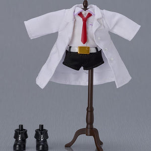 A display of the fabric clothing accessories: the lab coat, shirt and tie, shorts, and separate boots.