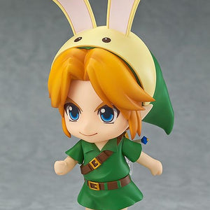 The Nendoroid Link figure wearing the yellow and pink Bunny Hood accessory, posed as if running quickly.