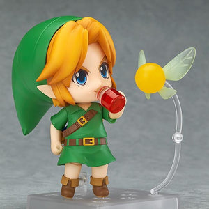 Nendoroid Link figure posed drinking the included Red Potion accessory, with his fairy companion, Tatl, floating beside him.