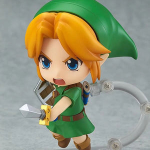 The Nendoroid Link figure featuring the "shouting" face plate, posed aggressively for combat with the Kokiri Sword and Hero's Shield.