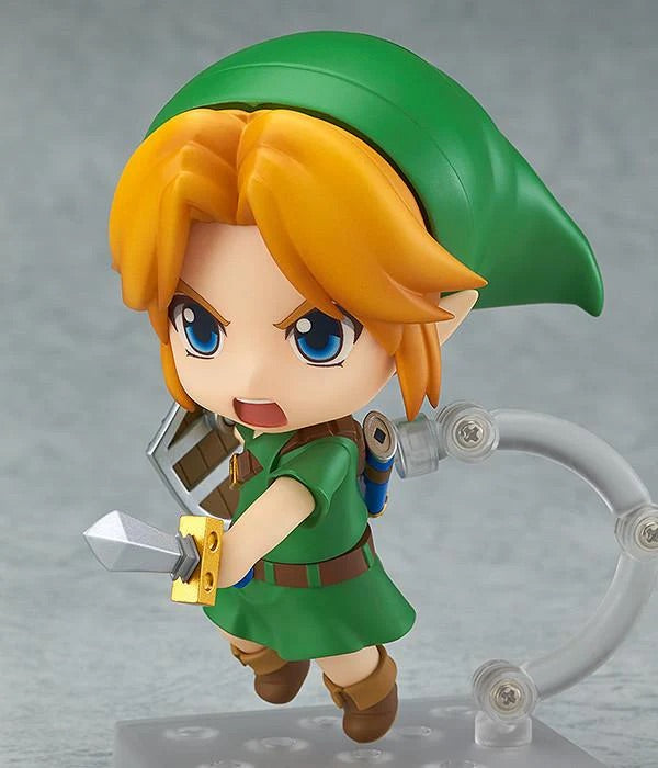 The Nendoroid Link figure featuring the "shouting" face plate, posed aggressively for combat with the Kokiri Sword and Hero's Shield.