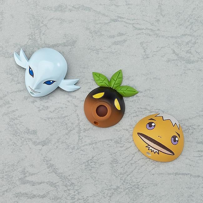 A display of the three transformation mask accessories: the blue Zora Mask, the Deku Mask, and the yellow Goron Mask.