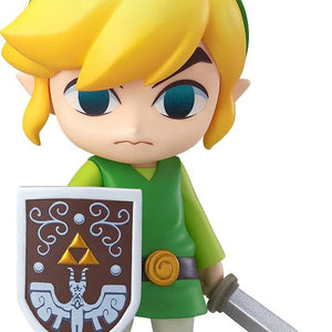 Full frontal view of the Good Smile Nendoroid Link: The Wind Waker Ver. figure, holding the Hero's Sword and Hero's Shield with a determined expression.