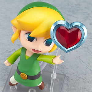 The Nendoroid Link figure in a happy pose, reaching out towards the included Heart Container accessory.