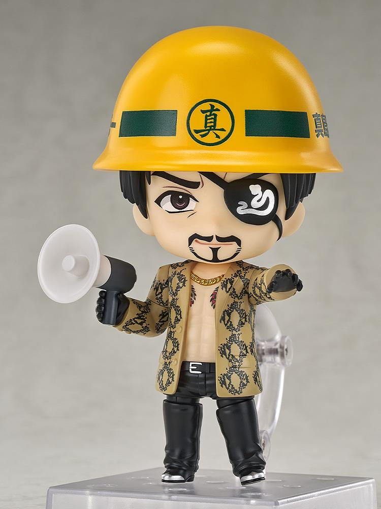 Majima Nendoroid figure wearing the Majima Construction helmet and holding a megaphone accessory.