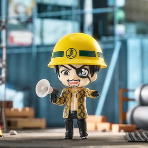Majima Nendoroid figure wearing the construction helmet and holding the megaphone, set in a construction site diorama.