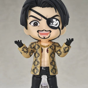 The Majima Nendoroid figure with the cheerful smiling face plate, posed with hands up, welcoming a challenge.