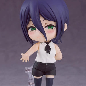 The Reze Nendoroid figure with a sweet expression and slight blush marks, posed with one hand behind her back.