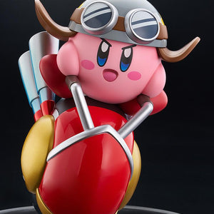 Close-up front view of the Kirby Wheelie Rider figure isolated on a black background, capturing the vibrant colors and detailed sculpt of the Good Smile collectible.