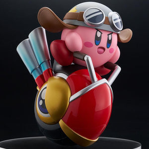 Front-right view of the Kirby Wheelie Rider figure displayed on a clear circular base against a solid black studio background.