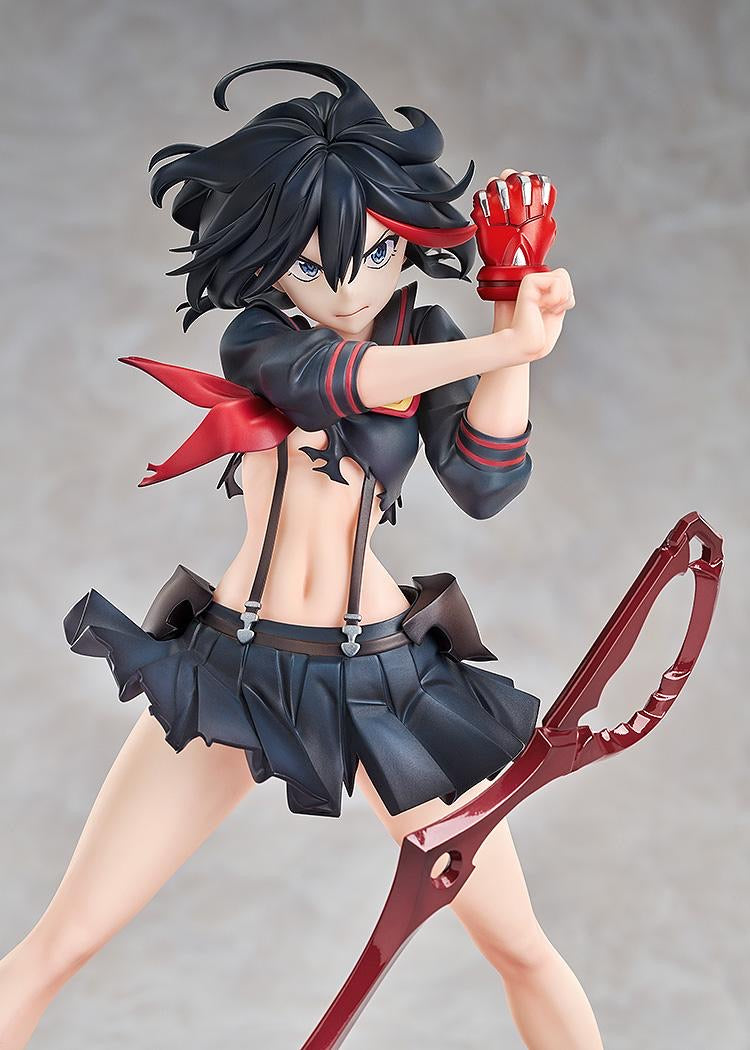 A mid-range frontal view of the Ryuko Matoi figure, showcasing her determined face, uniform, and the full Scissor Blade.