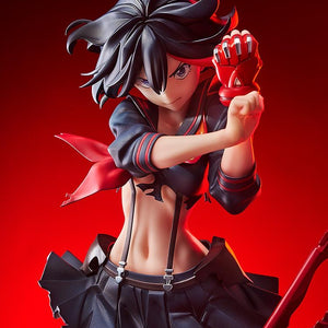 An extreme close-up of the Ryuko Matoi figure, showing the intricate sculpt of her hair, abs, and the torn Senketsu uniform.