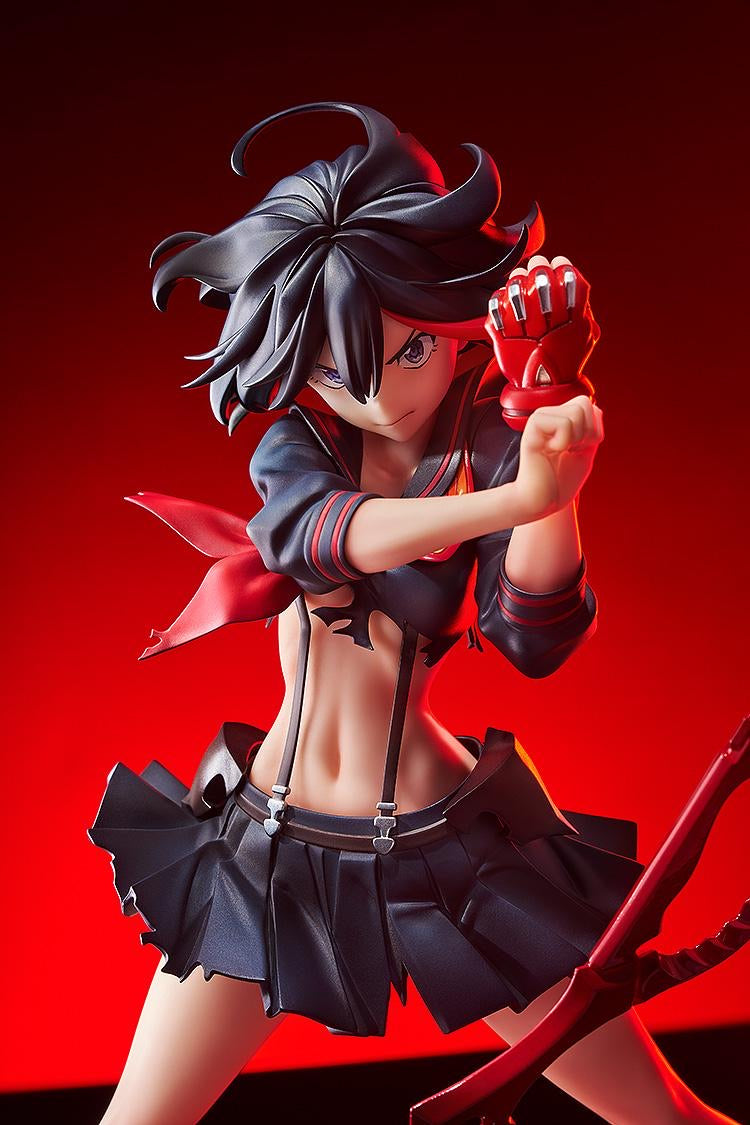 An extreme close-up of the Ryuko Matoi figure, showing the intricate sculpt of her hair, abs, and the torn Senketsu uniform.