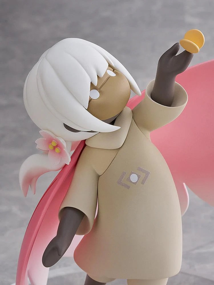 A close-up portrait shot of the Child of the Light figure's upper body, holding the butterfly, against a neutral gray background.