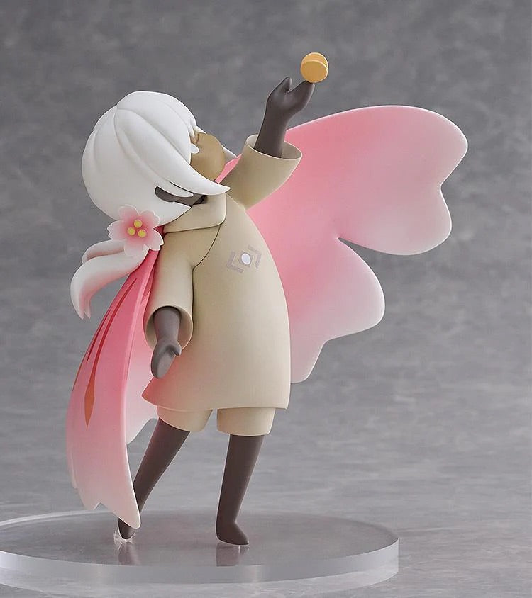 Side profile of the Child of the Light figure, showing the flow of the pink wing cape and the yellow light/butterfly accessory.