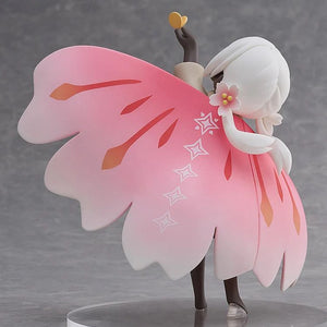 Rear view of the Child of the Light figure, focusing on the large, detailed pink wing cape with star patterns and the flower on its shoulder.