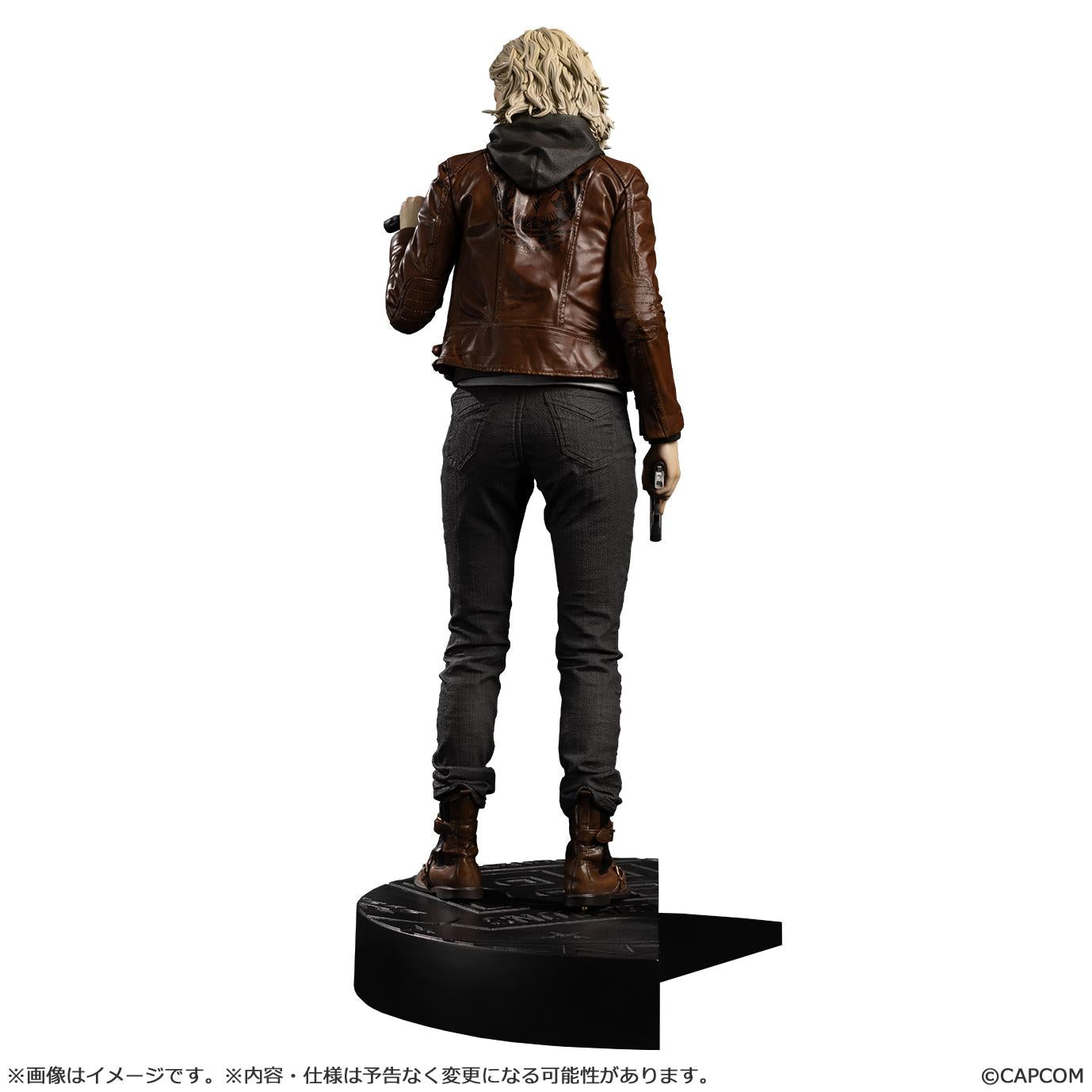 Rear view of the Grace Ashcroft Capcom Figure Builder statue, detailing her brown leather jacket, hoodie, and tactical clothing.