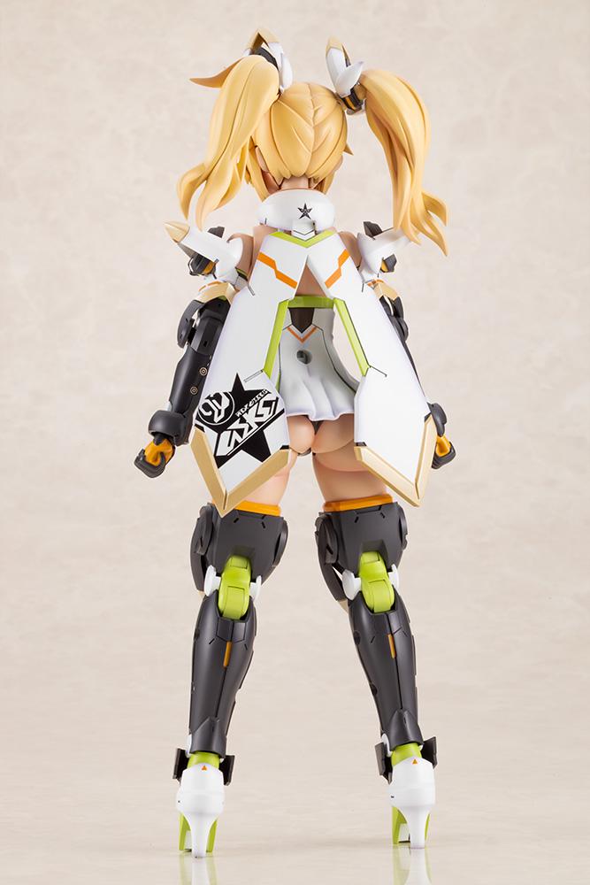 Full body rear view of the Kotobukiya Grande Scale Gene Stellatears model kit, highlighting the white capelet armor, blonde twintail hair, and detailed mechanical leg articulation.