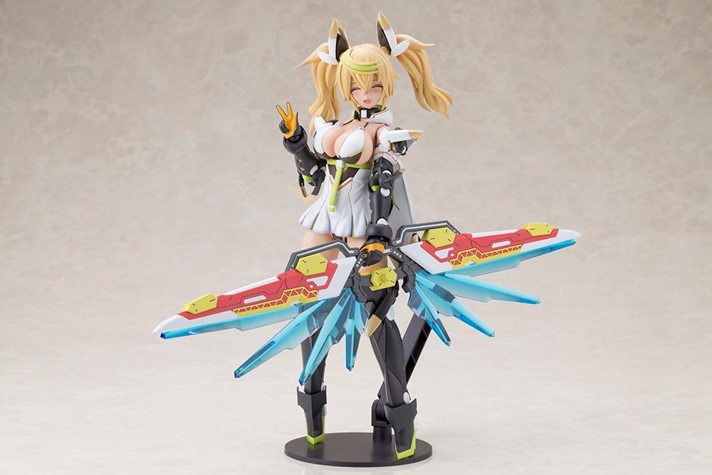 Full body side profile view of the Grande Scale Gene Stellatears model kit figure making a peace sign while holding the deployed red and blue Fossil Bauer weapon.