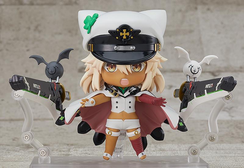 Action-packed battle pose of the Ramlethal Valentine Nendoroid figure shouting with wide open arms and floating weapons.