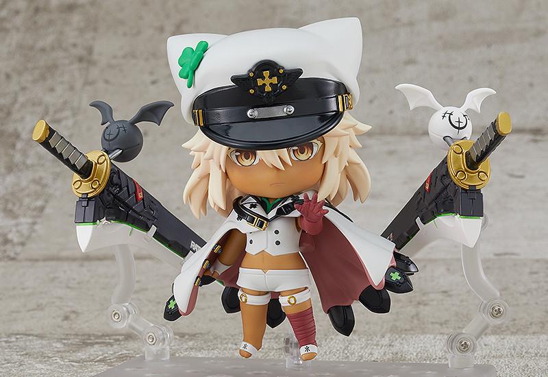 Front view of the Ramlethal Valentine Nendoroid figure reaching her hand forward with dual greatswords mounted on clear stands.