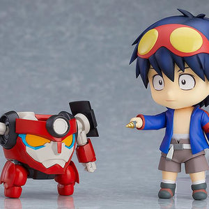 Separated Lagann form mecha standing next to Nendoroid Simon holding core drill