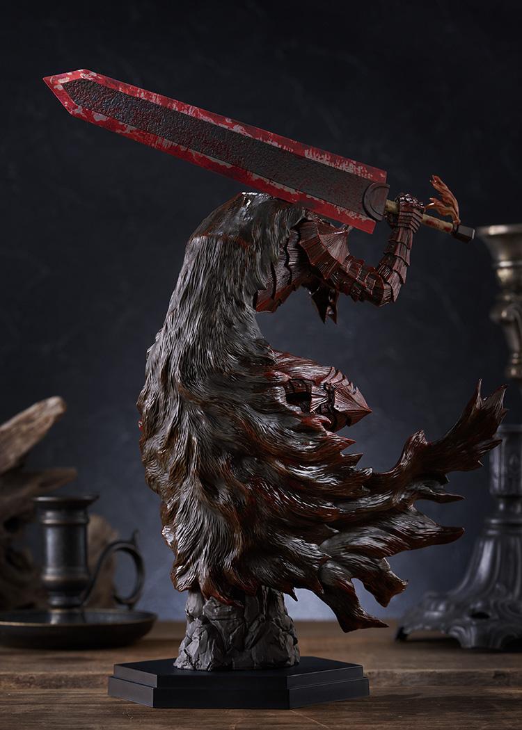 Rear angle view highlighting the weathered torn cape and blood detailing on Pop Up Parade L Guts figure