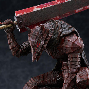 Close-up shot of Guts Berserker Armor beast helmet with red eye slit and blood paint effects
