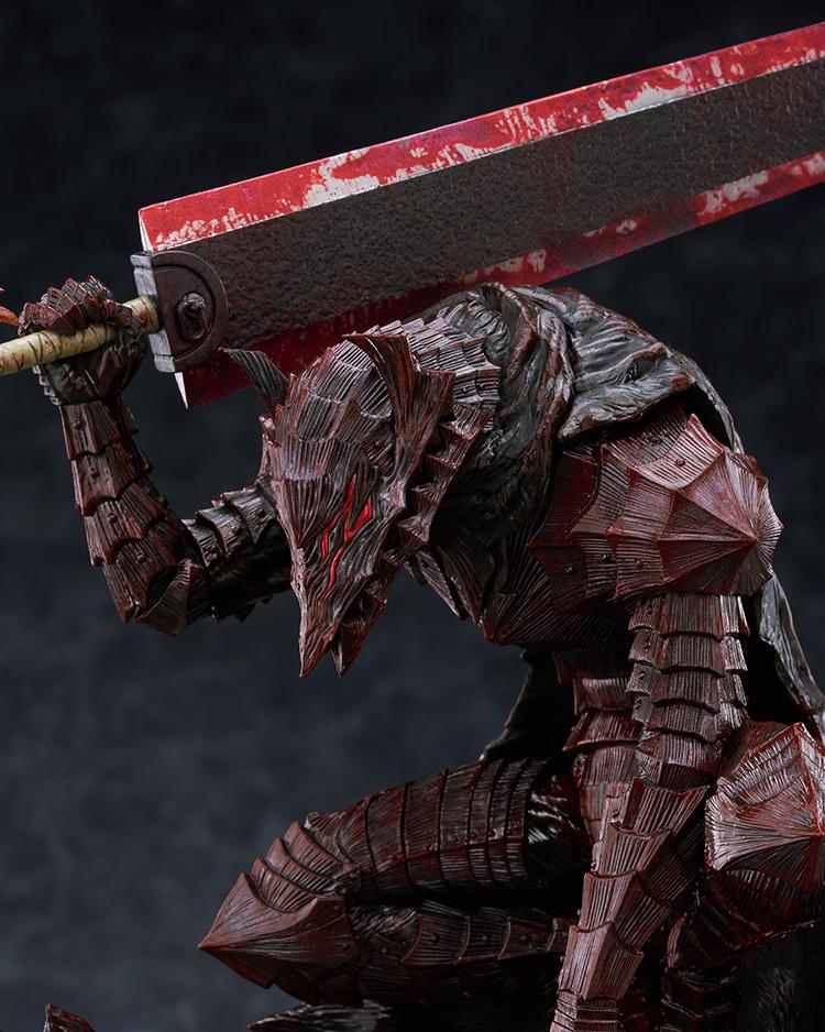 Close-up shot of Guts Berserker Armor beast helmet with red eye slit and blood paint effects