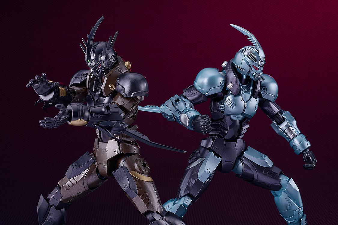 Comparison shot showing the Gale Hound Guyver 03 alongside a Guyver 01 style model in a combat stance.