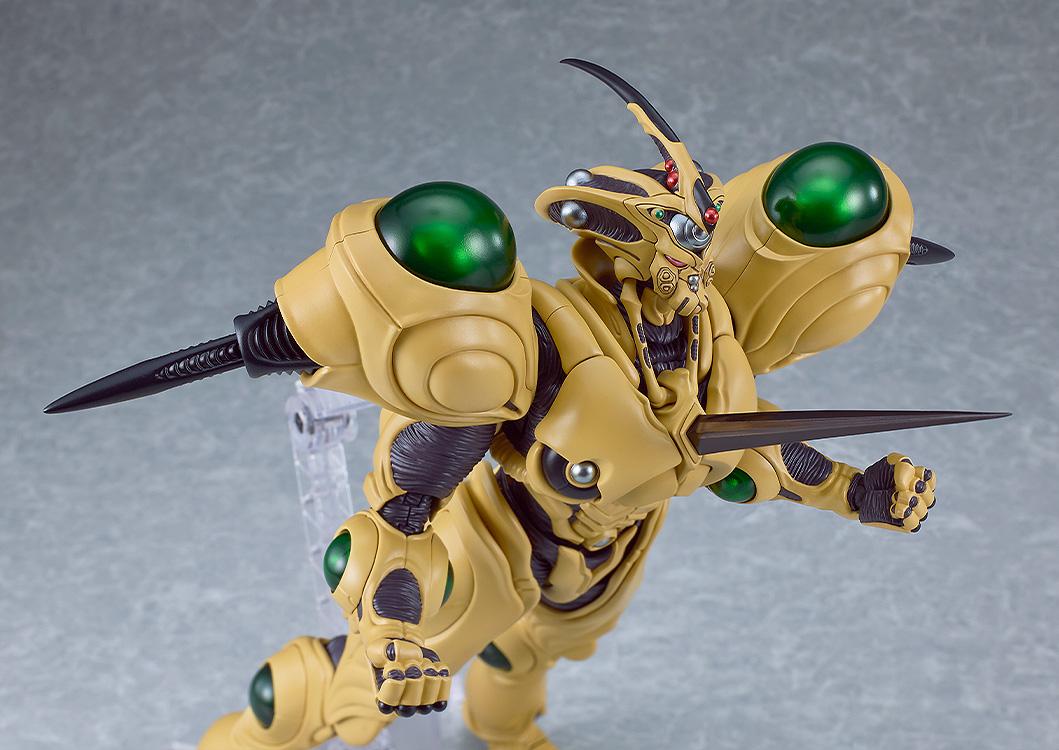 The Guyver Gigantic figma lunging forward with the Gravity Ram chest spike deployed against a grey background.