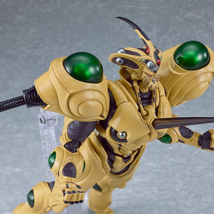 The Guyver Gigantic figma lunging forward with the Gravity Ram chest spike deployed against a grey background.