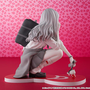 Rear three-quarter promotional angle of the Gyaru Tomie x Hello Kitty figure displaying her hair texture and accessories against a pink background.