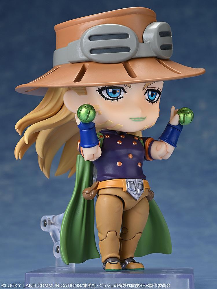 Gyro Zeppeli Nendoroid posing with two green Iron Balls, showcasing his unique facial markings and blonde hair.