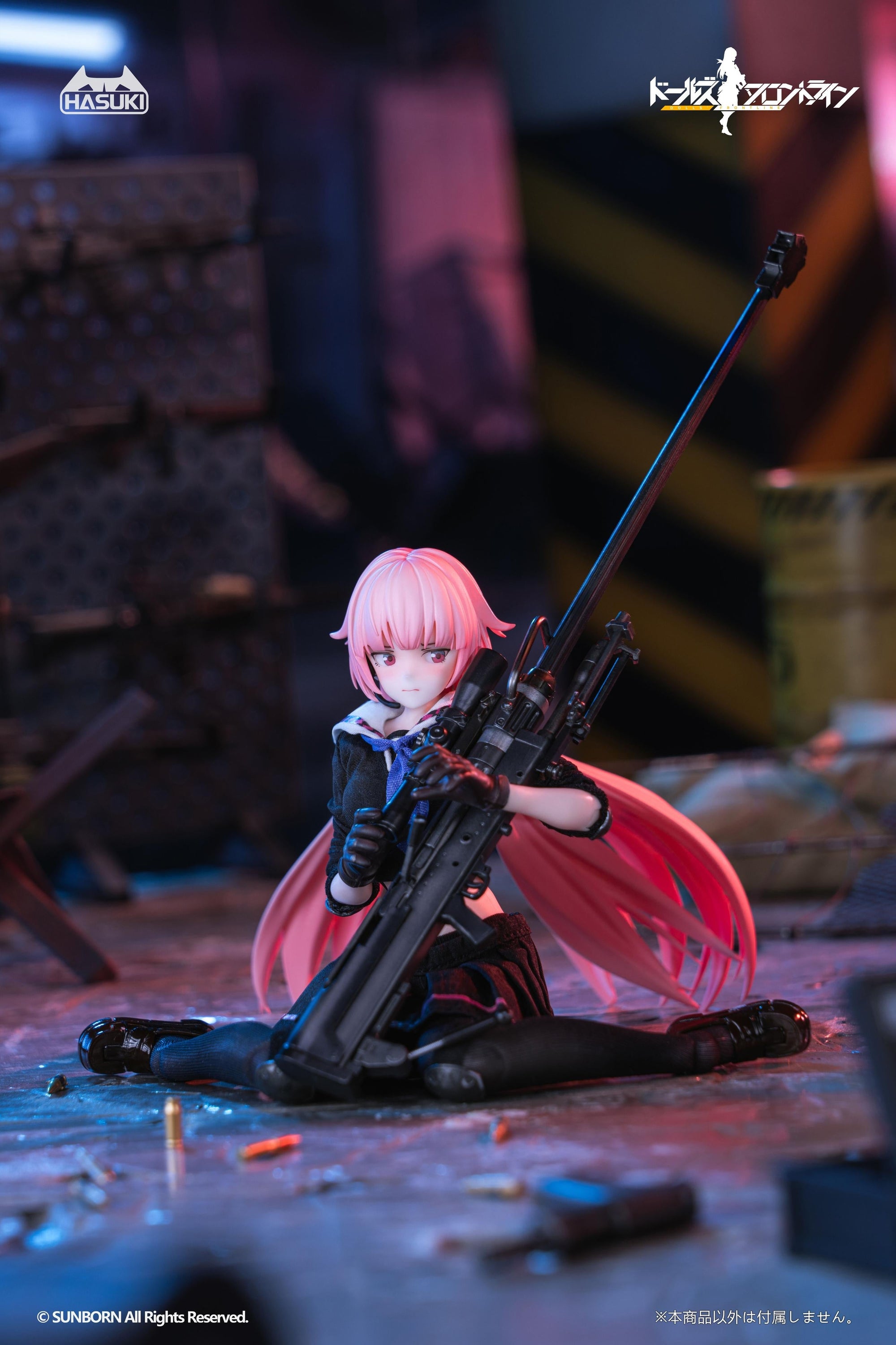 The Girls' Frontline NTW-20 figure sitting on the ground in an industrial setting, appearing to inspect or reload her sniper rifle.