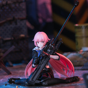 The Girls' Frontline NTW-20 figure sitting on the ground in an industrial setting, appearing to inspect or reload her sniper rifle.