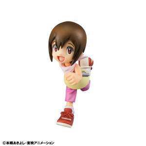 Close-up detail of the Kari Kamiya (Hikari Yagami) figure in a joyful running pose with her signature pink shorts and yellow top.