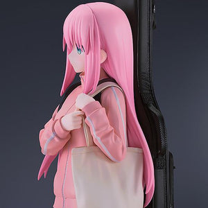 Side profile of the Hitori Gotoh figure showing the pink tracksuit detail and tote bag.