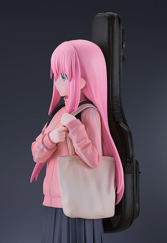 Side profile of the Hitori Gotoh figure showing the pink tracksuit detail and tote bag.