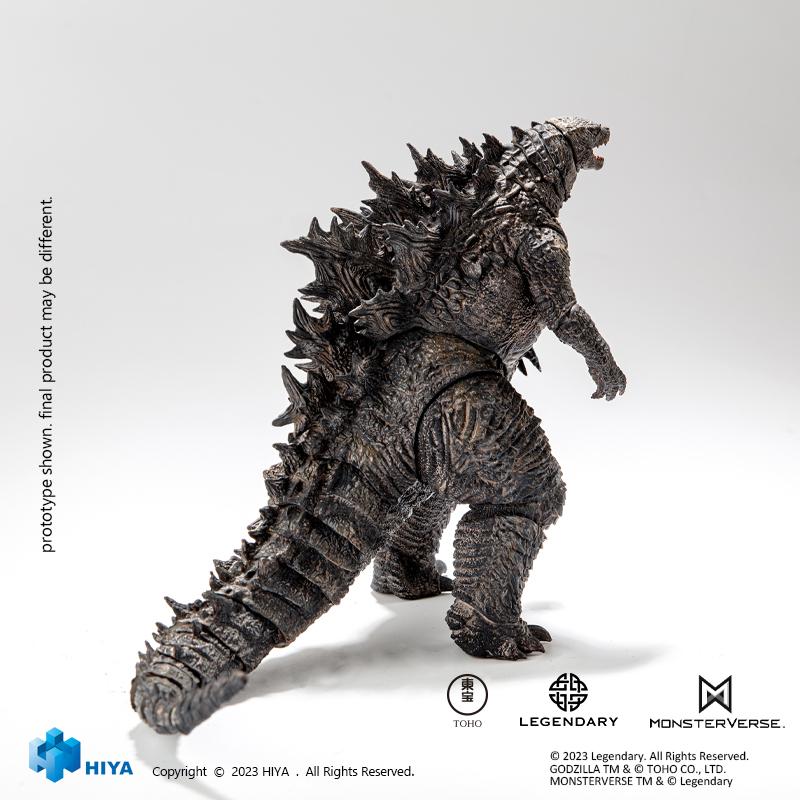 Rear view of HIYA Exquisite Basic Godzilla 2019 action figure showcasing dorsal spiky plates and long articulated tail.