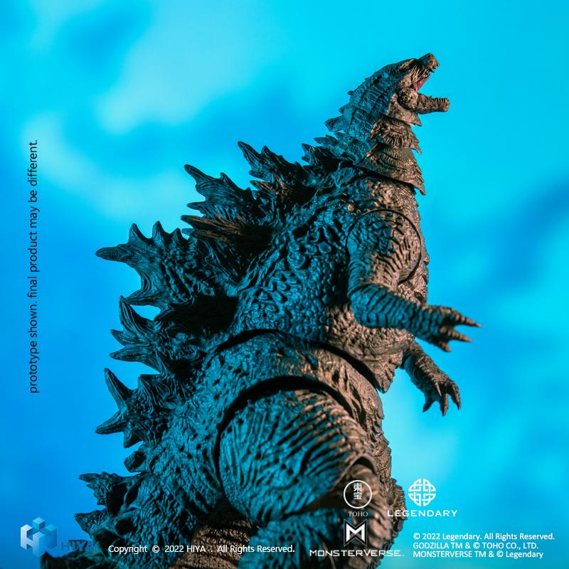 Side profile view of HIYA Exquisite Basic Godzilla 2021 figure under blue lighting highlighting spiky dorsal plates.