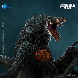 High-detail close-up of Biollante's head sculpt showing multiple rows of sharp fangs, red eye, and vine-laced torso over the glowing core.