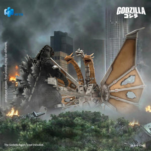 Battle diorama of Mecha-King Ghidorah deploying mechanical capture clamps around Godzilla in city ruins.