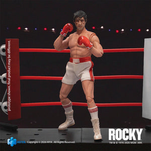 1/12 scale Rocky Balboa action figure posed in a fighting guard stance inside a boxing ring diorama.