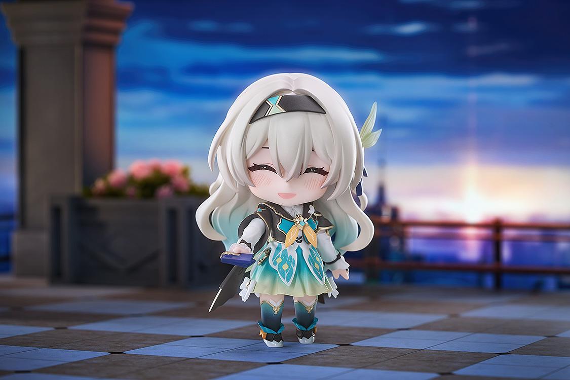 Diorama view of Firefly Nendoroid figure with smiling face plate holding budget accessory