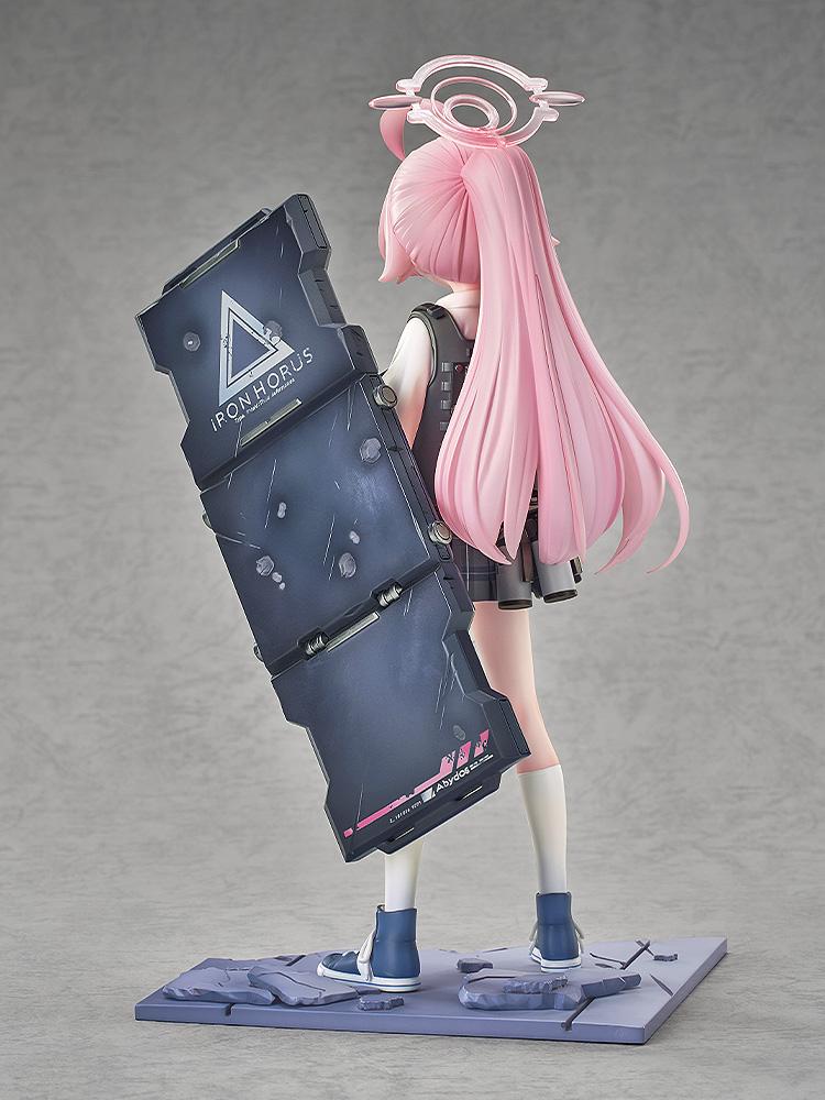 Back view of the Hoshino Battle scale figure showing the back of the shield and hair detail against a plain background.