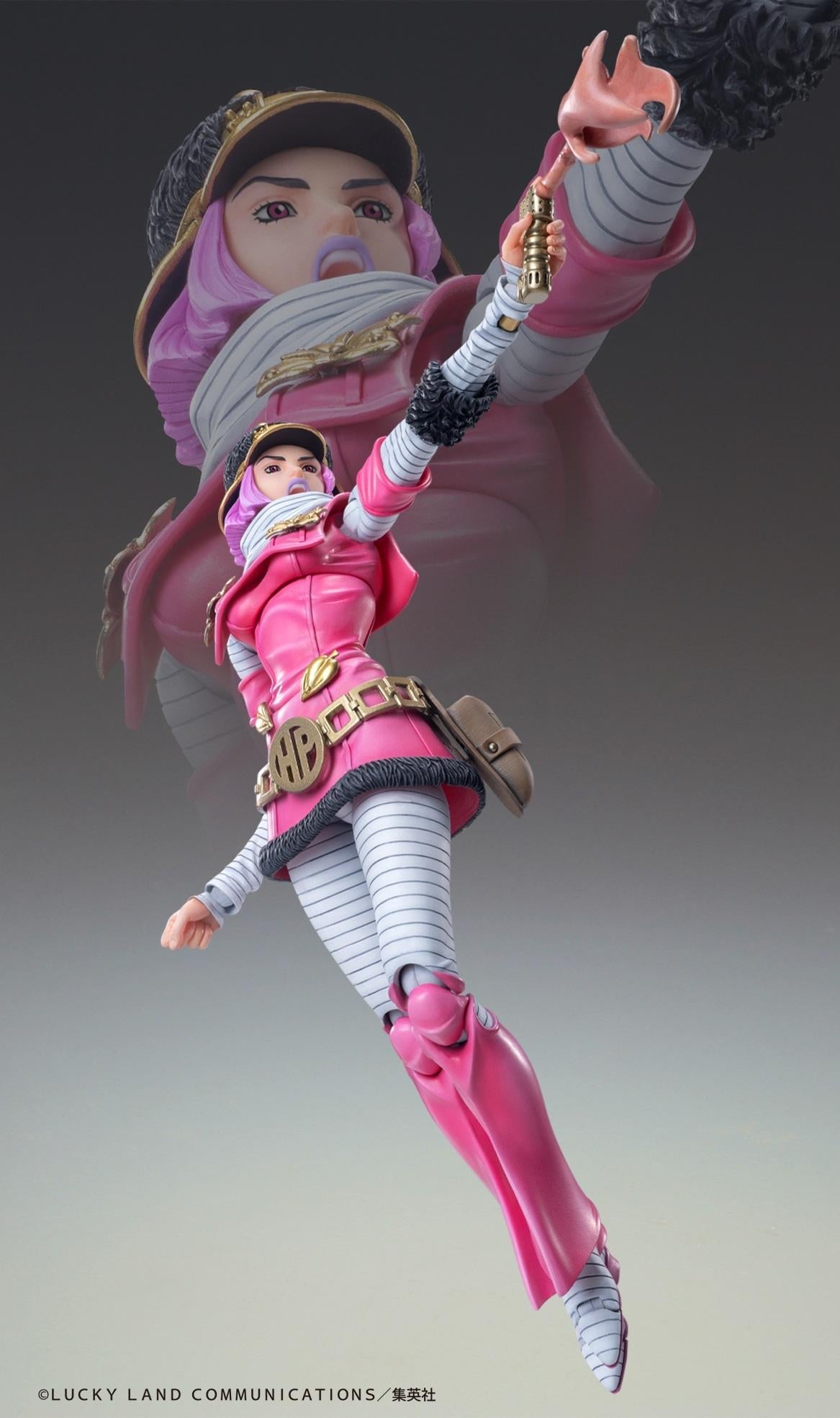 Dynamic action pose of Hot Pants using the Cream Starter spray canister with translucent pink effect parts.