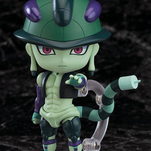 The Meruem Nendoroid figure from Hunter x Hunter posed reaching forward with his articulated tail visible against a dark marbled background.