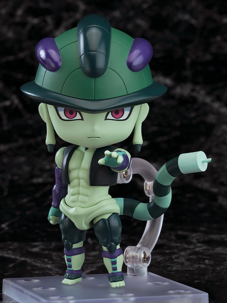 The Meruem Nendoroid figure from Hunter x Hunter posed reaching forward with his articulated tail visible against a dark marbled background.