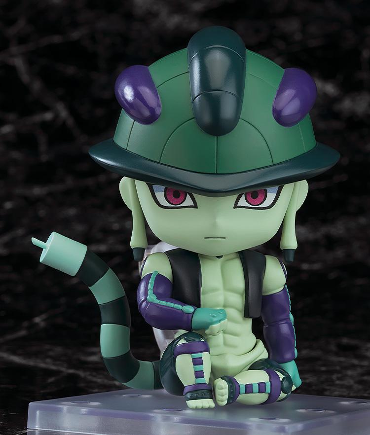 Hunter x Hunter Meruem Nendoroid action figure utilizing the interchangeable sitting leg parts, calmly resting his arm on his knee.